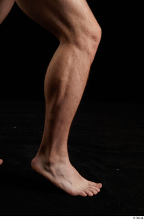 Trent  1 calf flexing nude side view 0007.jpg